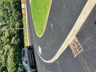 New carriageway surfacing with footway tie-in